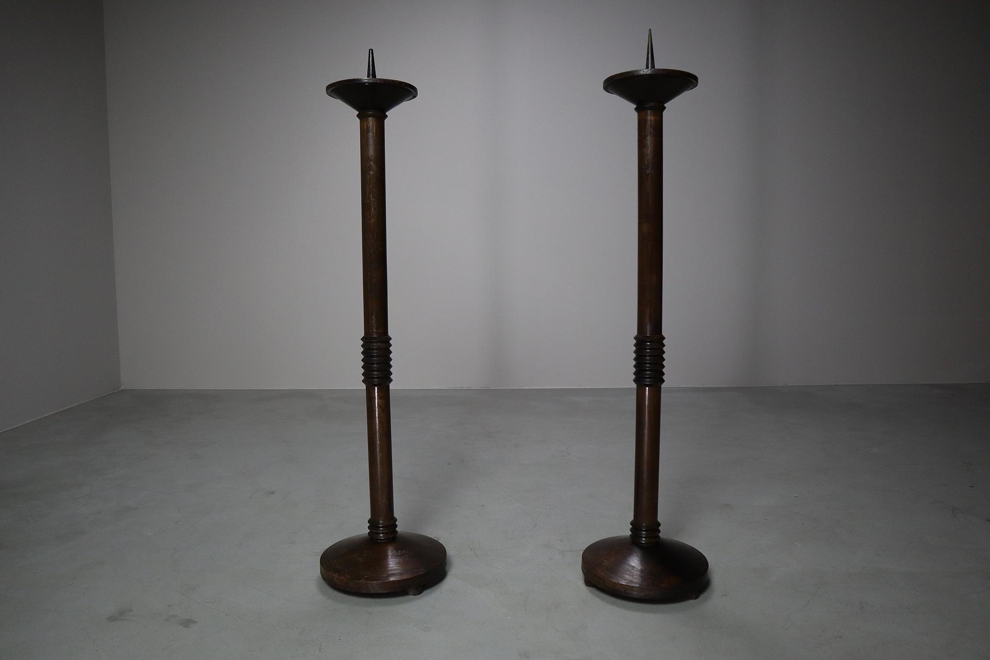 A pair of modernist candle holders