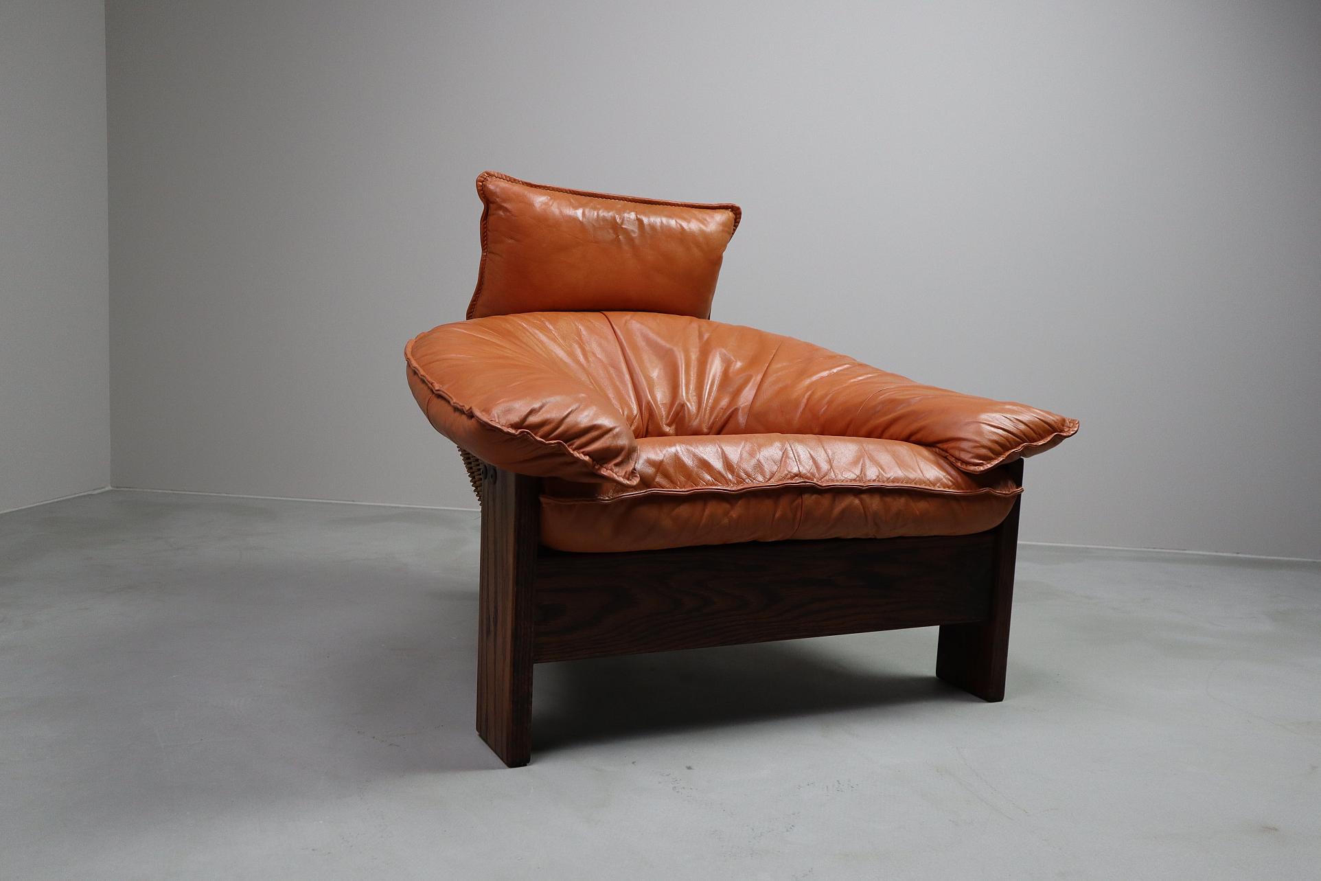 Vintage tripod leather lounge chair 